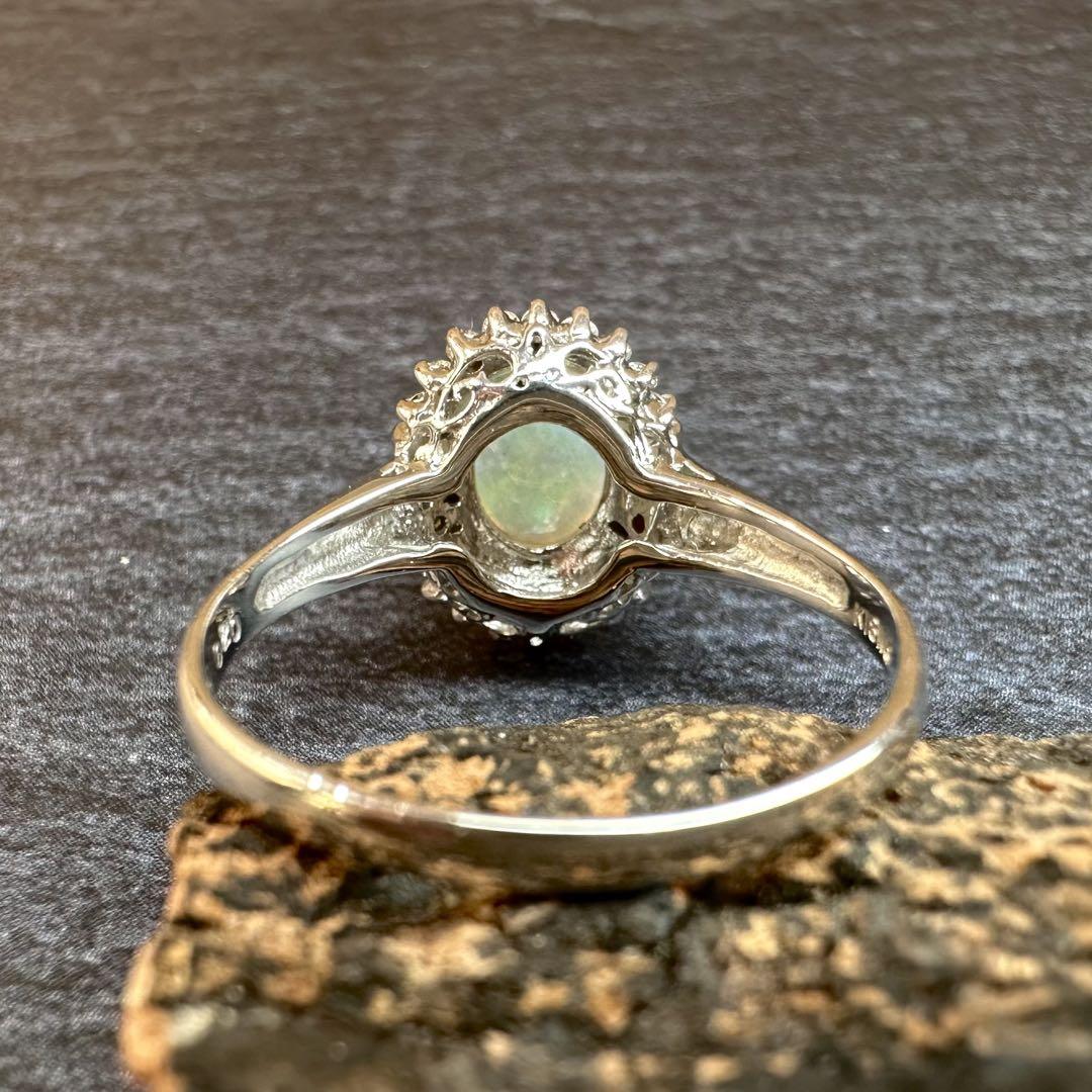 【K18WG】オーストラリア産オパール 0.60ct ダイヤモンド取巻きリング