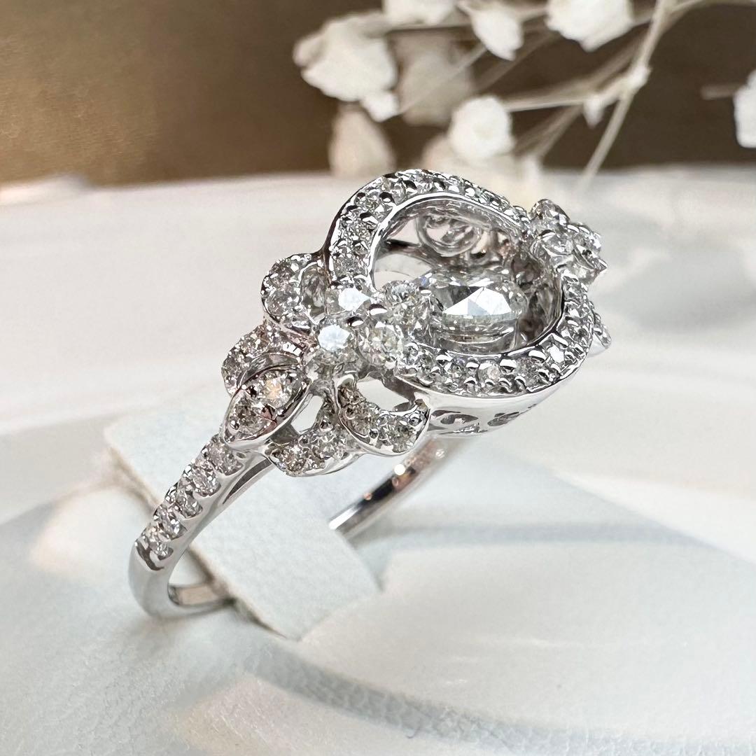 【K18】ダイヤモンド 0.35ct/0.41ct 中央ストーン可動 リング