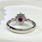 【美品】PT900 ルビー 0.71ct ダイヤ取り巻き デザインリング