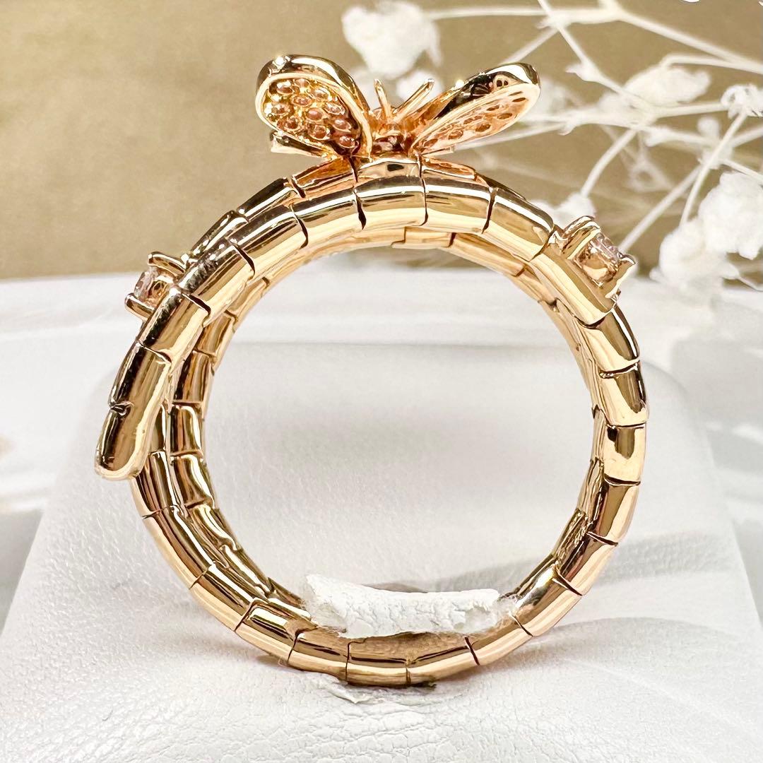 【K18】サファイア 0.22ct スパイラルリング 蝶モチーフ