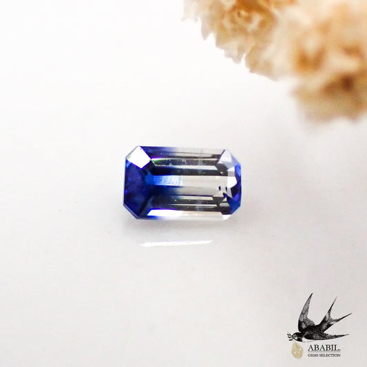 天然雙色藍寶石 0.096ct [斯里蘭卡] 清晰無色和藍色熒光